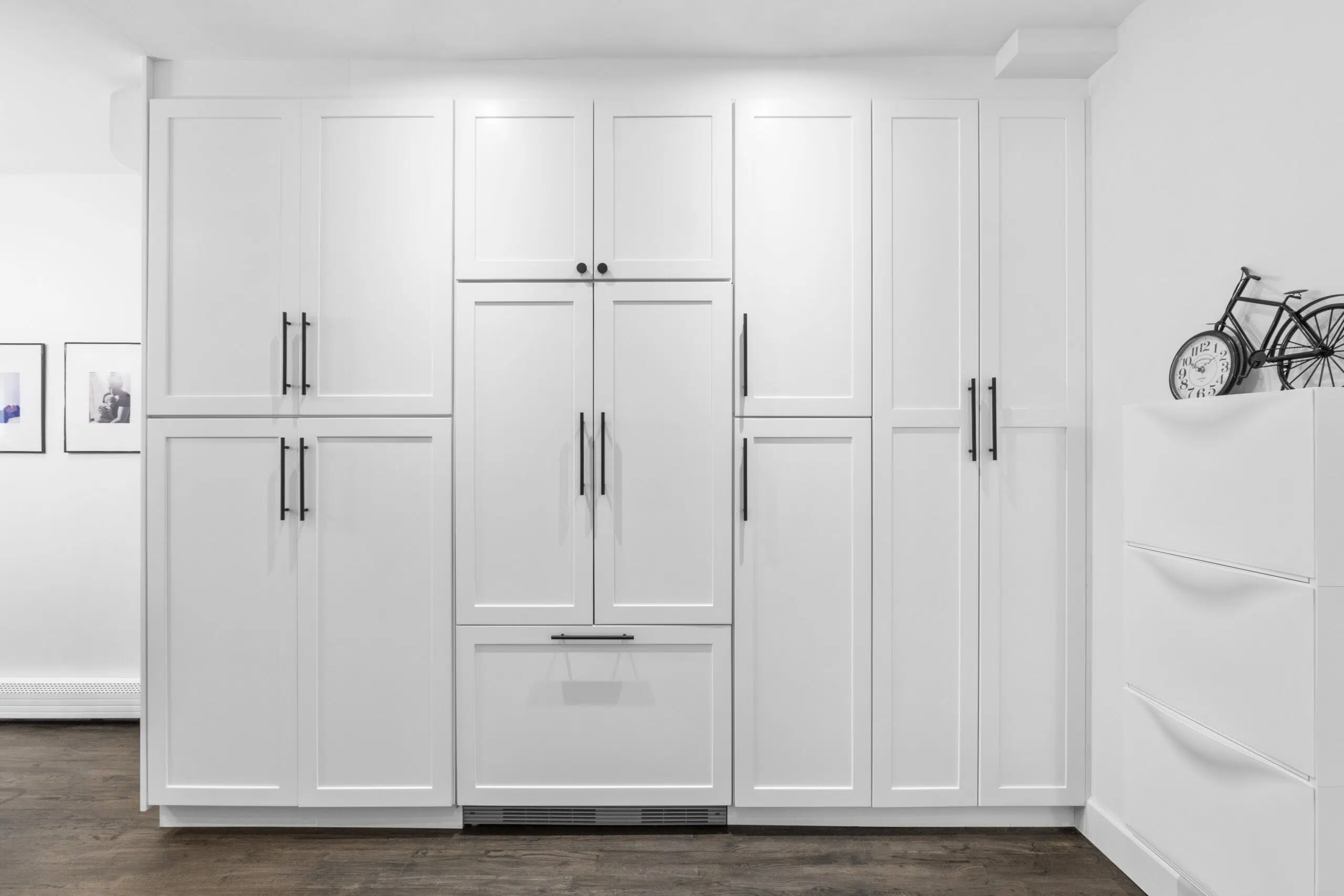 bad kitchen design with refrigerator matching the cabinets 