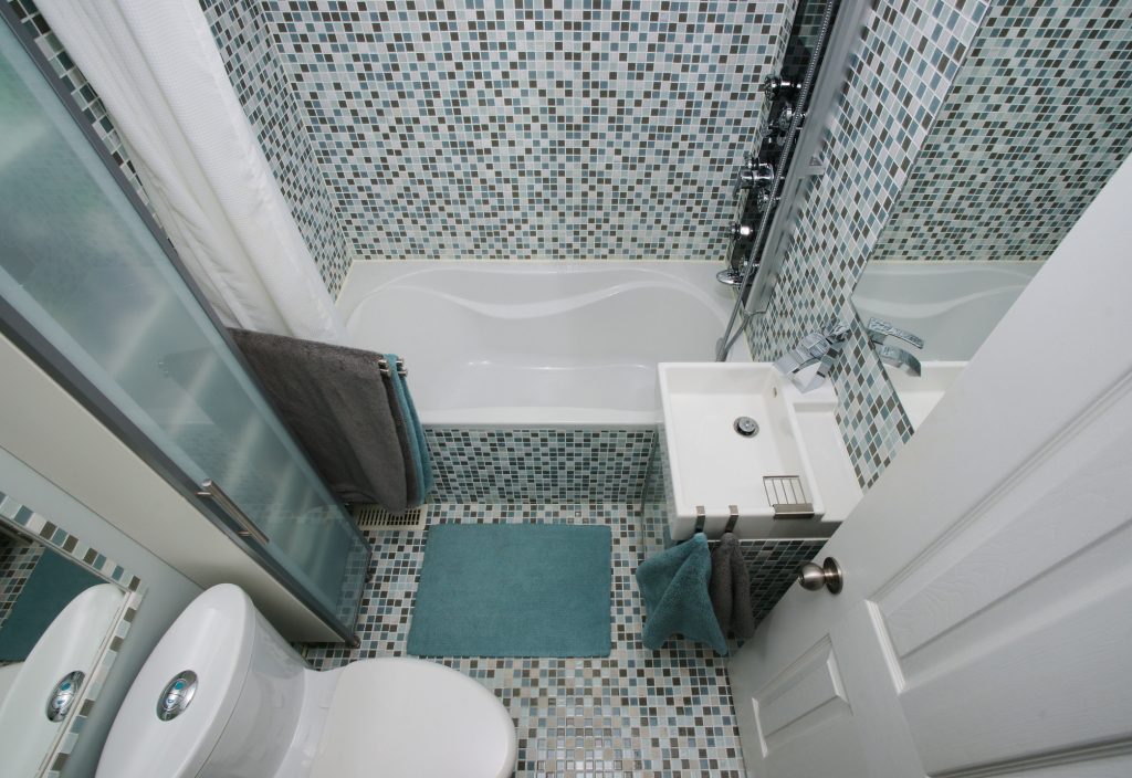 tiny mosaic tiles in a tiny bathroom 